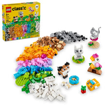 LEGO Classic set with various animal figures and building blocks on a white background