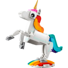Toy unicorn with a rainbow design on a white background