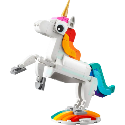 Toy unicorn with a rainbow design on a white background